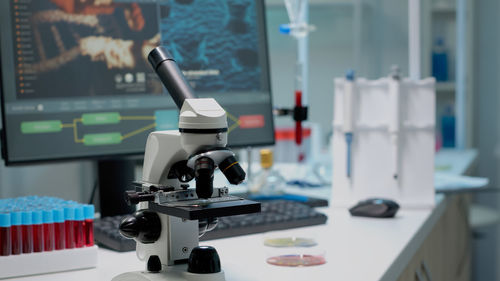 Close-up of man working in laboratory