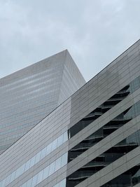 Low angle view of modern building against sky