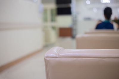 Close-up of sofa on table at home