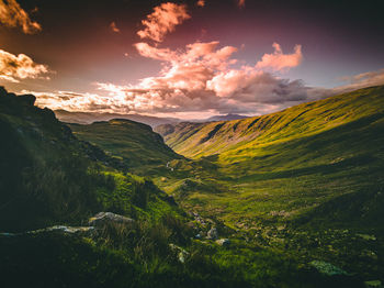 Scenic view of landscape against sky during sunset