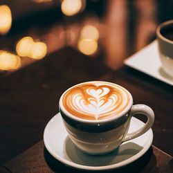 Close-up of cappuccino on table