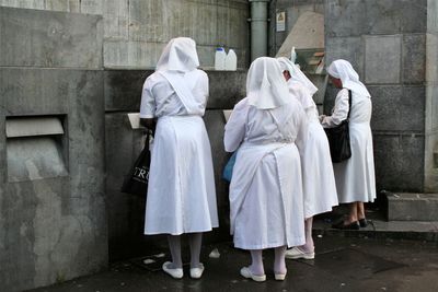 Women standing in a temple