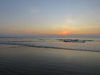 Scenic view of sea at sunset