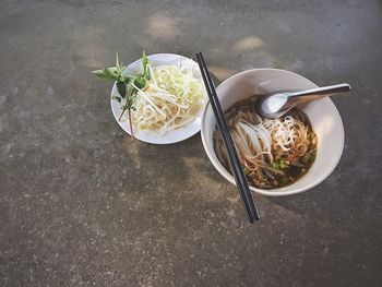 High angle view of noodle soup in bowl on table