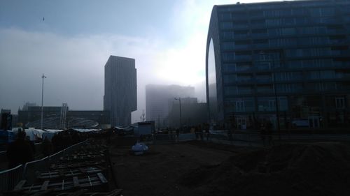 Modern cityscape against sky