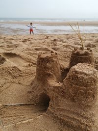 Scenic view of beach against sky