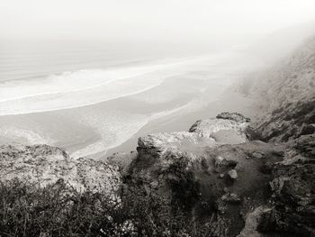 High angle view of sea and mountains