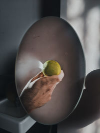 Close-up of hand holding ball