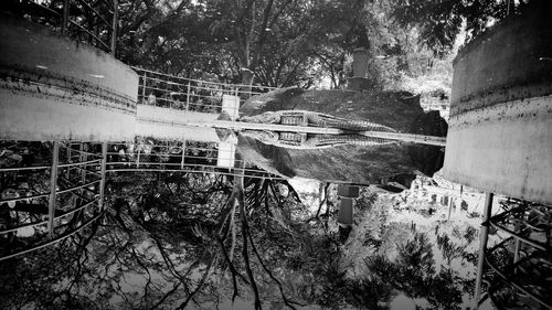 Abandoned boat moored on riverbank