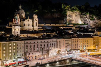 Buildings in city at night