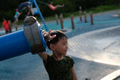 Boy playing in water