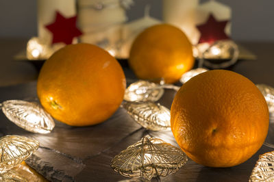 Close-up of oranges on table