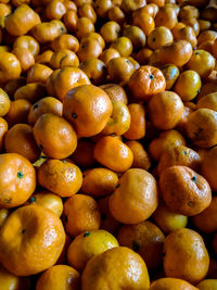 Full frame shot of oranges at market stall