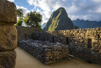 Stone wall against sky