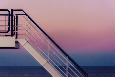 Scenic view of sea against clear sky during sunset