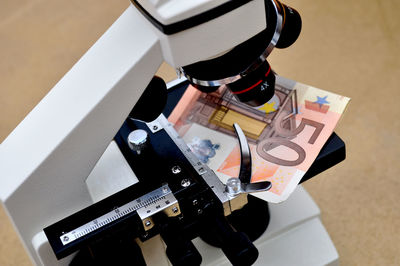 Close-up of camera on table