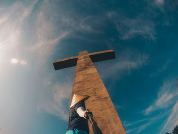 Low angle view of man against sky