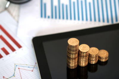 High angle view of coins on table