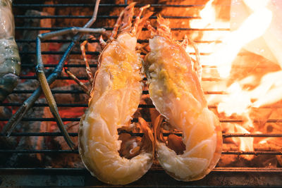 Close-up of meat on barbecue grill