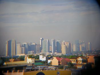 Modern cityscape against sky