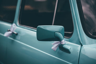 Close-up of wedding car