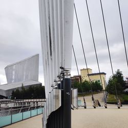 View of modern building against cloudy sky