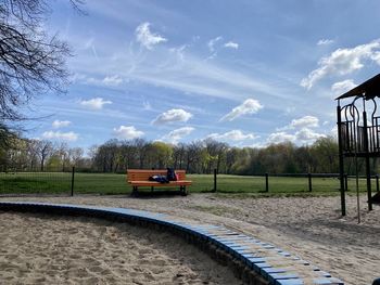 Train on field against sky