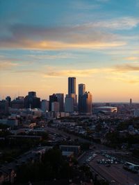 Cityscape against sky during sunset