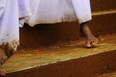 Low section of man on steps