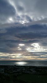 Scenic view of sea against sky at sunset