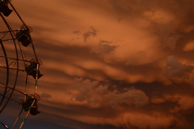 Low angle view of silhouette trees against sky at sunset