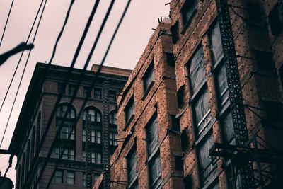 Low angle view of buildings against sky
