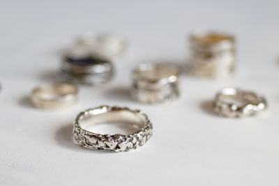 Close-up of wedding rings on white background