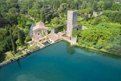 Transverse aerial view of the gardens of nymph in the country of cisterna di latina