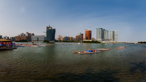 Panorama of the macau waterfront during dragon boat festival