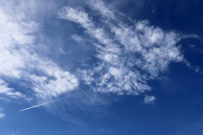 Low angle view of vapor trail in sky