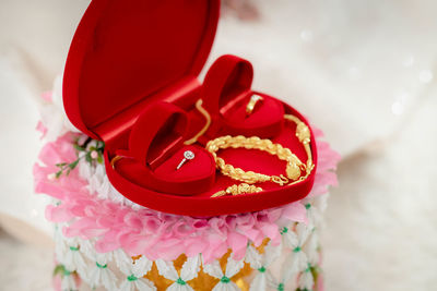 Close-up of wedding rings on table