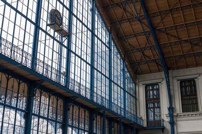 Inside building of the railway station made of glass and metal in budapest, hungary