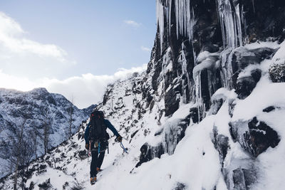 Panoramic view of snowcapped mountain against sky