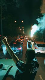 People on street at night