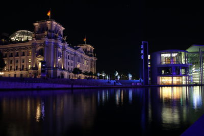 View of city lit up at night