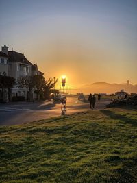 Scenic view of buildings against sky during sunset