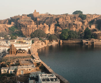 Aerial view of ancient built structure by lake