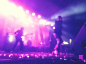 Close-up of illuminated music concert at night