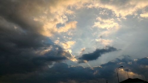 Low angle view of dramatic sky during sunset