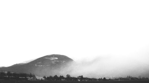 Scenic view of mountains during foggy weather