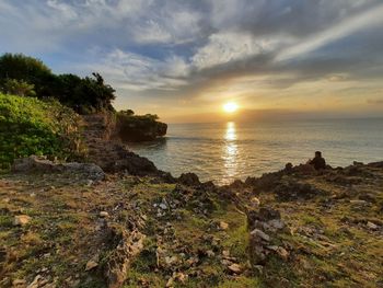 Scenic view of sea against sky during sunset