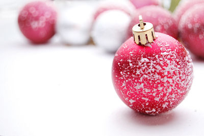 Close-up of christmas ornaments on table