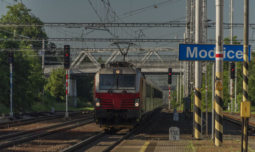 Train on railroad track against sky