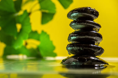 Close-up of stone stack on table